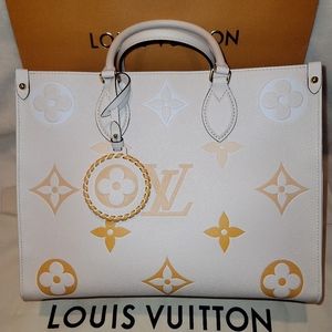 By Pool Safron Cream Onthego MM Leather Giant Monogram Bag & Charm
